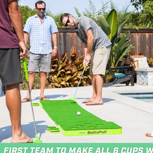 three men playing battleputt outdoors