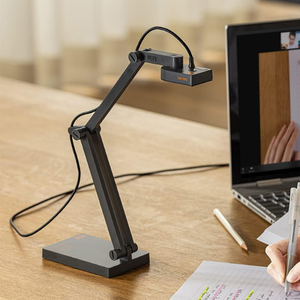 document camera on a table next to a laptop