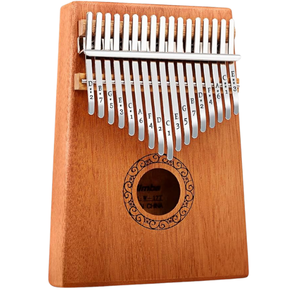 tan colored kalimba instrument