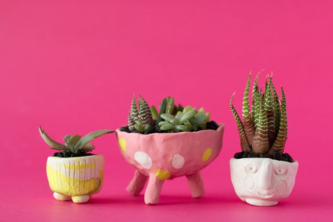 mini yellow, pink with polka dots, and white polymer clay pots