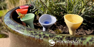 PHOTO clay bee drinking cups in a pot