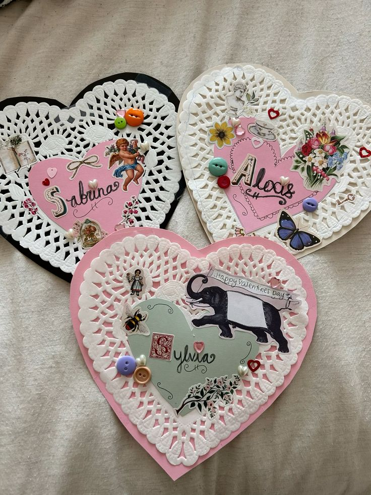 Example of junk Valentines with hearts cut out and various supplies glued down.